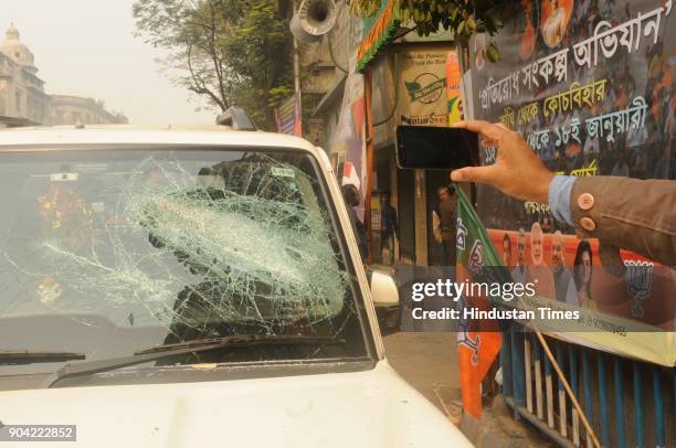 Damaged BJP supporter's car in front of BJP party office after tension between BJP and Trinamool supporters at North Kolkata area on January 12, 2018...