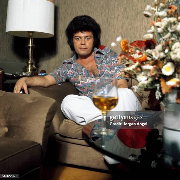 Gary Glitter poses in a hotel in 1974 in Copenhagen, Denmark.