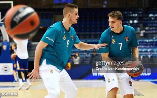 Luka Doncic, #7 of Real Madrid and Dino Radoncic, #6 of Real Madrid in action during the warm up before 2017/2018 Turkish Airlines EuroLeague Regular...
