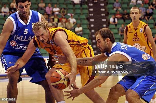Pero Antic of F.Y.R. Of Macedonia fights for the ball with Greece's Vasilis Spanoulis during their 2009 European championship preliminary round,...