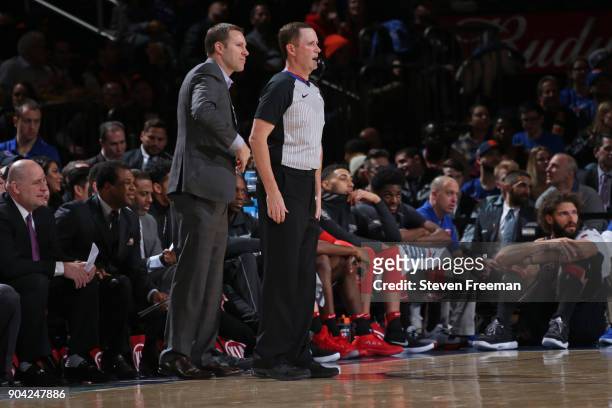 Referee, Matt Boland and Fred Hoiberg of the Chicago Bulls look on during the game against the New York Knicks on January 10, 2018 at Madison Square...
