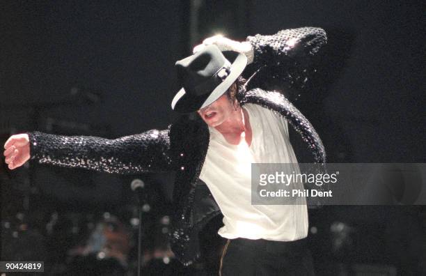 Michael Jackson performs on stage on his HIStory tour in December 1996.