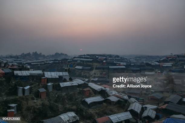 The sun sets over Balukhali camp on January 12, 2018 in Cox's Bazar, Bangladesh. Over 650,000 Rohingya have crossed the border to Bangladesh since...