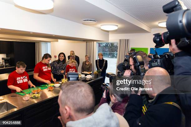 Crown Princess Mary of Denmark in the kitchen together with kids preparing food during the Princess visit at The Christmas Seal Foundation's home...