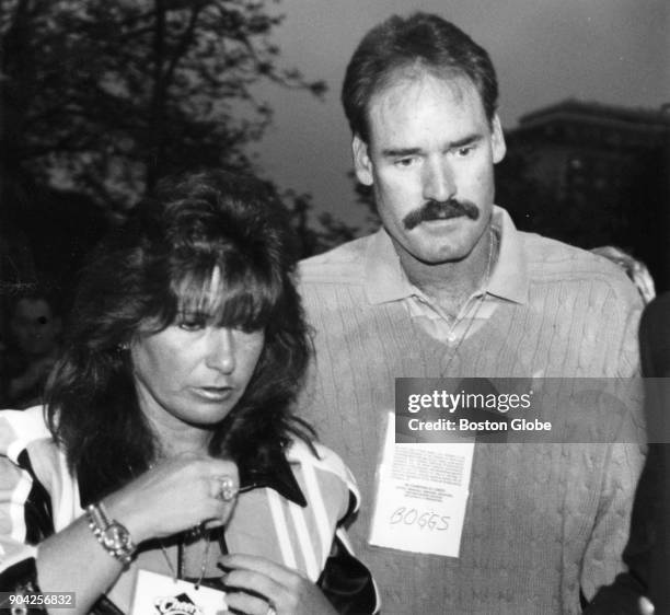 Debbie Boggs, left, and Wade Boggs, right, attend festivities outside the Hampshire House in Boston, May 20, 1993.