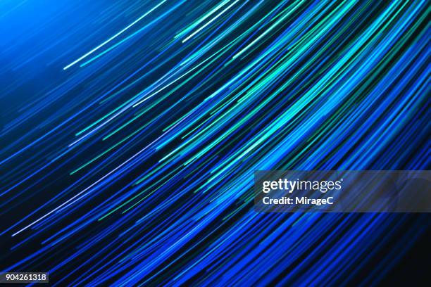 blue colored dynamic light trails - 斜めから見た図 ストックフォトと画像