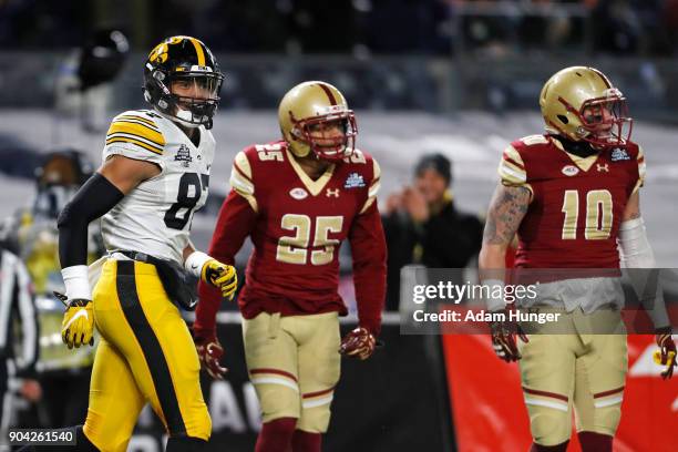 Noah Fant of the Iowa Hawkeyes after scoring a touchdown against the Boston College Eagles during the first half of the New Era Pinstripe Bowl at...