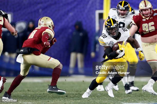 James Butler of the Iowa Hawkeyes in action against the Boston College Eagles during the first half of the New Era Pinstripe Bowl at Yankee Stadium...