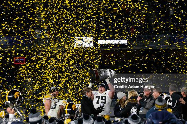 Sean Welsh of the Iowa Hawkeyes celebrates after defeating the Boston College Eagles in the New Era Pinstripe Bowl at Yankee Stadium on December 27,...