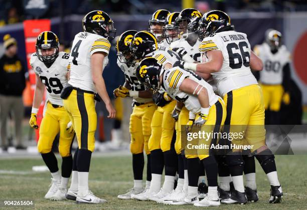 Nathan Stanley of the Iowa Hawkeyes in action against the Boston College Eagles during the second half of the New Era Pinstripe Bowl at Yankee...