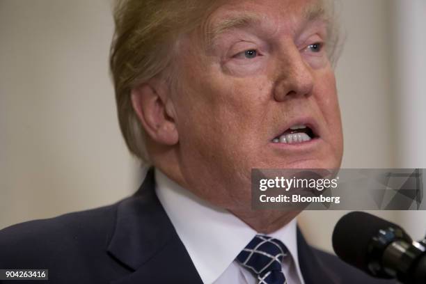 President Donald Trump speaks before signing a proclamation for Martin Luther King Jr. Day in the Roosevelt Room of the White House in Washington,...