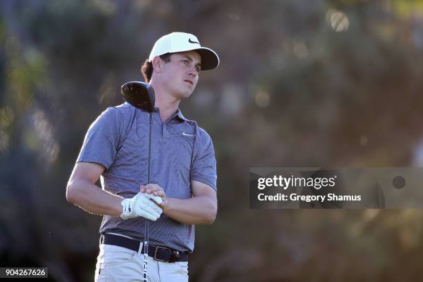 Cody Gribble of the United States plays his shot from the first tee during round two of the Sony Open In Hawaii at Waialae Country Club on January...