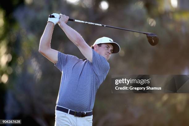 Cody Gribble of the United States plays his shot from the first tee during round two of the Sony Open In Hawaii at Waialae Country Club on January...