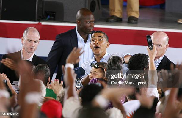 President Barack Obama greets supporters after speaking to a crowd at the annual AFL-CIO Labor Day picnic at Coney Island September 7, 2009 in...