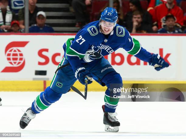 Ben Hutton of the Vancouver Canucks skates up ice during their NHL game against the Calgary Flames at Rogers Arena December 17, 2017 in Vancouver,...