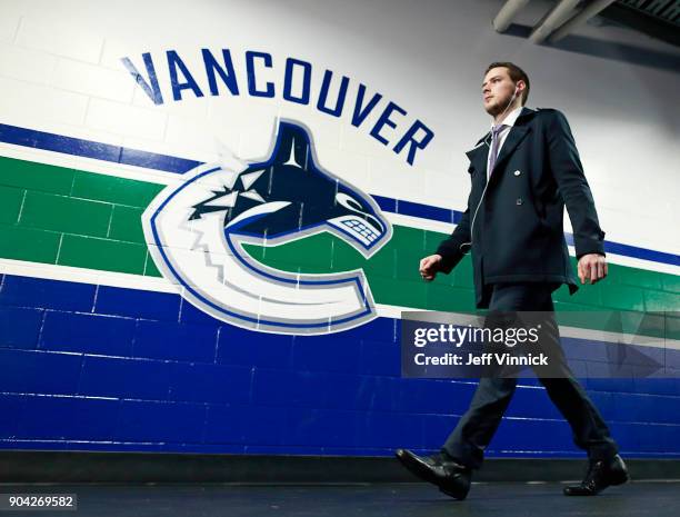 Brendan Gaunce of the Vancouver Canucks walks to his dressing room during their NHL game against the Calgary Flames at Rogers Arena December 17, 2017...