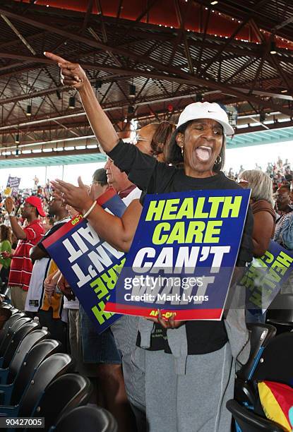 Supporter of U.S. President Barack Obama screams during his speech at the annual AFL-CIO Labor Day picnic at Coney Island September 7, 2009 in...