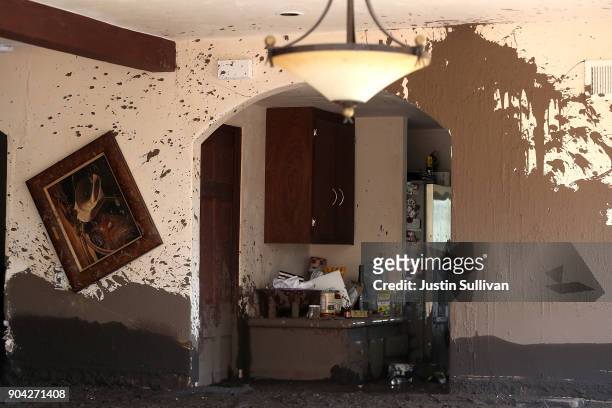 Mud fills a home that was destroyed by a mudslide on January 12, 2018 in Montecito, California. 17 people have died and hundreds of homes have been...