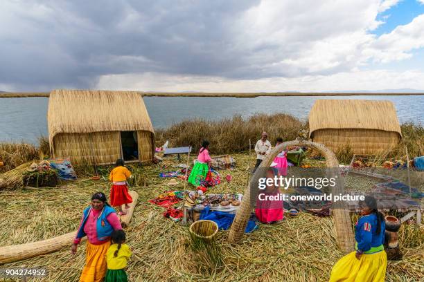 Peru, Puno, boat trip to the Uros, which live on floating islands of reeds on the lake. They live by agriculture and tourism.