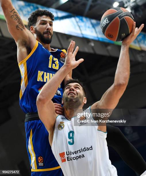 Felipe Reyes, #9 of Real Madrid competes with Anthony Gill, #13 of Khimki Moscow Region during the 2017/2018 Turkish Airlines EuroLeague Regular...