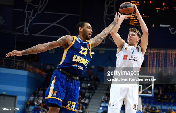 Luka Doncic, #7 of Real Madrid competes with Malcolm Thomas, #23 of Khimki Moscow Region during the 2017/2018 Turkish Airlines EuroLeague Regular...