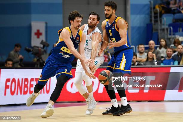 Rudy Fernandez, #5 of Real Madrid competes with Alexey Shved, #1 of Khimki Moscow Region and Anthony Gill, #13 of Khimki Moscow Region during the...