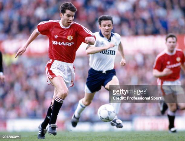 Darren Ferguson of Manchester United is chased by Paul Allen of Tottenham Hotspur during a Barclays League Division One match at Old Trafford on May...