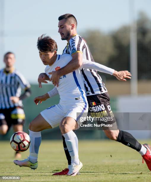 Jin Bo, Gjoko Zajkov during the friendly match between Royal Charleroi SC vs.Yanbian Funde FC at Pinatar Arena, Murcia, SPAIN. 10th January of 2018.