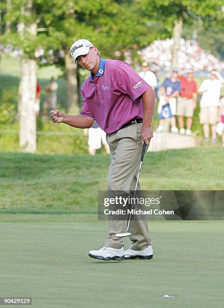 Steve Stricker reacts as his birdie putt drops on the 17th hole during the final round of the Deutsche Bank Championship at TPC Boston held on...