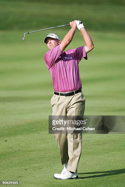 Steve Stricker hits his second shot on the 12th hole during the final round of the Deutsche Bank Championship at TPC Boston held on September 7, 2009...