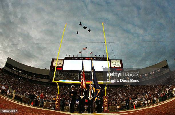 Fighter jets do a missing man fly-over to honor FSU graduate and U.S. Navy pilot Scott Speicher who was shot down in the first Gulf War during...