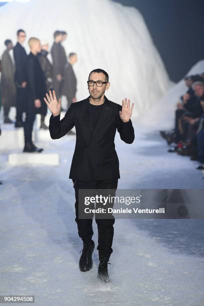 Designer Bruno Frisoni aknowledge the applause of the public after the the Ermenegildo Zegna show during Milan Men's Fashion Week Fall/Winter 2018/19...