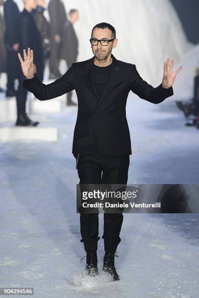 Designer Bruno Frisoni aknowledge the applause of the public after the the Ermenegildo Zegna show during Milan Men's Fashion Week Fall/Winter 2018/19...