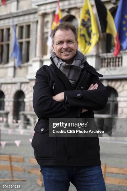 "You're The Best French Fry Ever"-- Host Phil Keoghan stands on the mat at the Pit Stop at the Grote Market in Antwerp, Belgium on THE AMAZING RACE,...