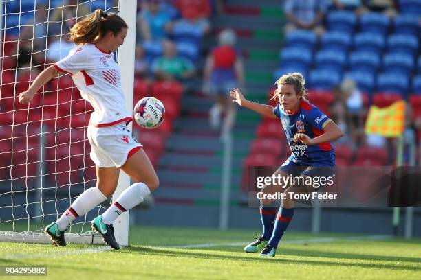 Kathleen Naughton of Adelaide stops a shot from Cassidy Davis of the Jets during the round 11 W-League match between the Newcastle Jets and Adelaide...
