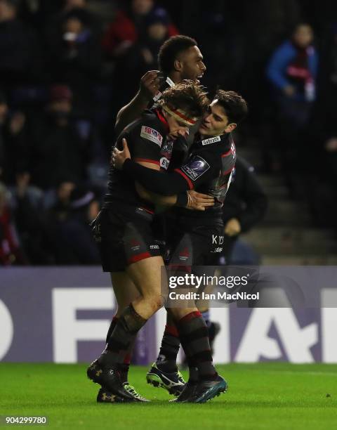 Hamish Watson of Edinburgh Rugby is congratulated on scoring a try by team mate Sam Hidalgo-Clyne during the European Rugby Challenge Cup match...