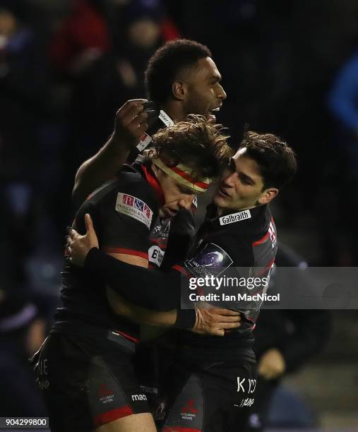 Hamish Watson of Edinburgh Rugby is congratulated on scoring a try by team mate Sam Hidalgo-Clyne during the European Rugby Challenge Cup match...