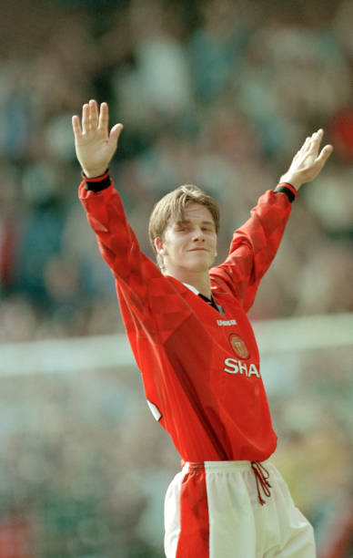 David Beckham of Manchester United celebrates his goal from the half-way line during the FA Carling Premiership match between Wimbledon and...