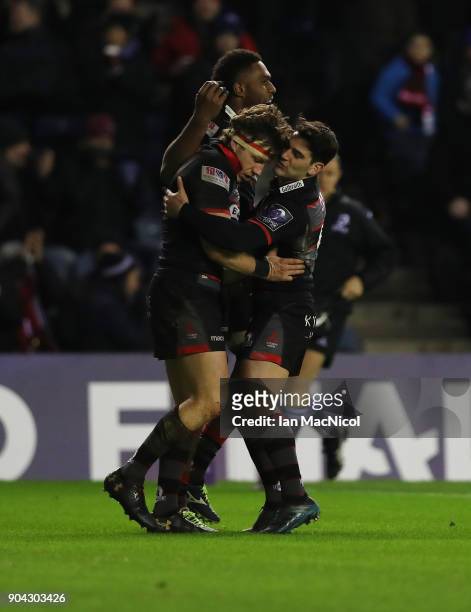 Hamish Watson of Edinburgh Rugby is congratulated on scoring a try by team mate Sam Hidalgo-Clyne during the European Rugby Challenge Cup match...