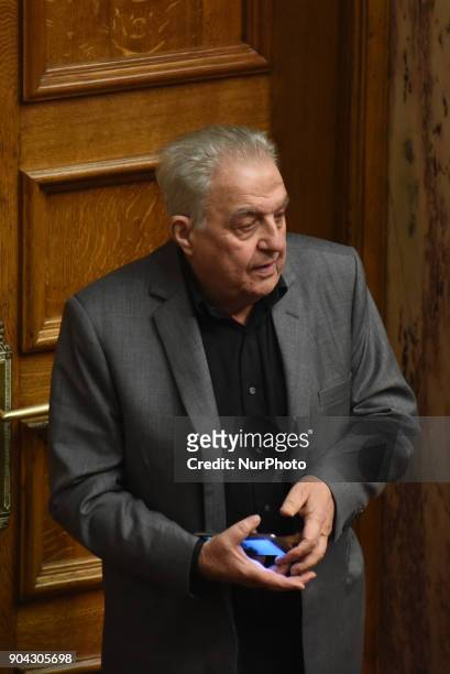 Minister of State Alekos Flabouraris at the Hellenic Parliament in Athens on January 12, 2018 during a discussion about an urgent draft law for the...