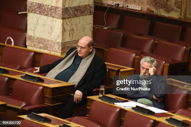 Lawmaker, Nikos Filis and Nikos Dritsas at the Hellenic Parliament in Athens on January 12, 2018 during a discussion about an urgent draft law for...