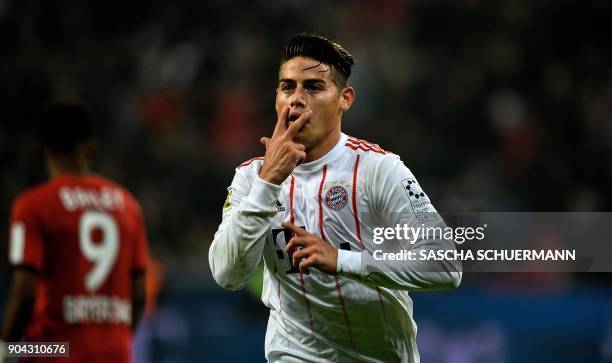 Bayern Munich's midfielder James Rodriguez celebrates after scoring during the German First division Bundesliga football match Bayer Leverkusen vs FC...