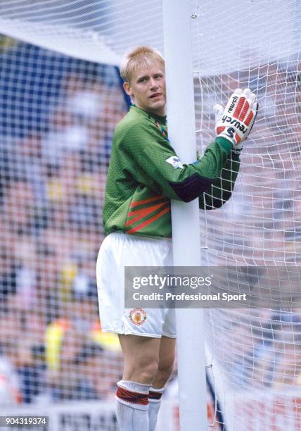 Peter Schmeichel of Manchester United wiping his gloves on the goal net during the FA Premier League match between Tottenham Hotspur and Manchester...