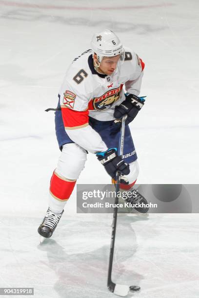 Alex Petrovic of the Florida Panthers skates with the puck against the Minnesota Wild during the game at the Xcel Energy Center on January 2, 2018 in...