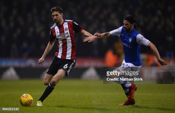 Chris Basham of Sheffield United and George Boyd of Sheffield Wednesday in action during the Sky Bet Championship match between Sheffield United and...