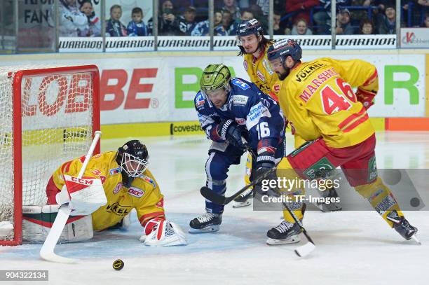 Goalkeeper Daniel Bakala of Duesseldorf, Jason Jaspers of Iserlohn, Daniel Weiss of Duesseldorf and Kevin Marshall of Duesseldorf battle for the ball...