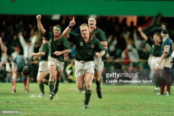 Francois Pienaar of South Africa celebrates after their victory in the Rugby Union World Cup Semi-Final against France at the King's Park Stadium in...