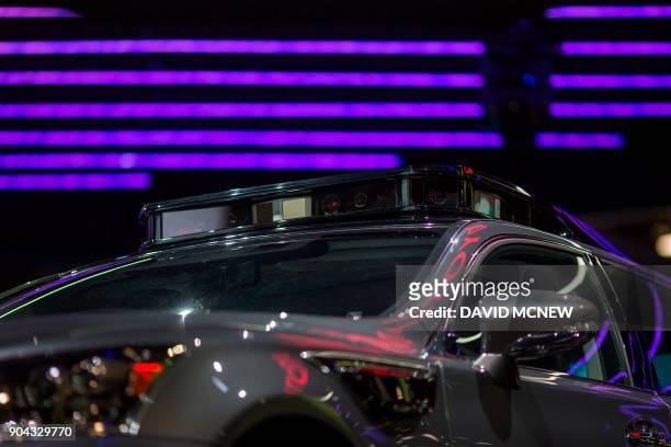 LiDAR sensors are seen on the roof of a Toyota concept car at CES in Las Vegas, Nevada, January 12, 2018. / AFP PHOTO / DAVID MCNEW