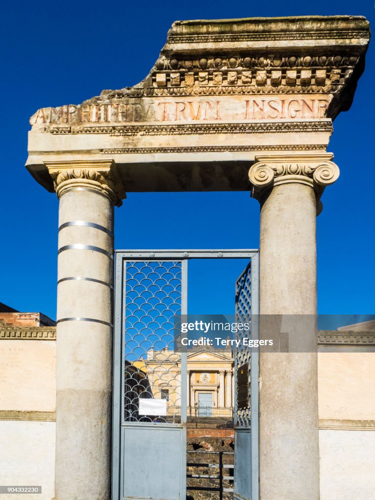 Part of the ruins of the Roman Amphitheatre with the Saint Biagio Church on Piazza Stesicoro.