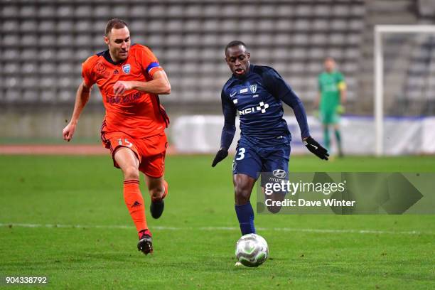 Souleymane Karamoko of Paris FC and Jimmy Nirlo of FBBP 01 during the Ligue 2 match between Paris FC and Bourg en Bresse at Stade Charlety on January...